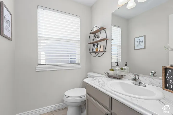 Bathroom with vanity and toilet