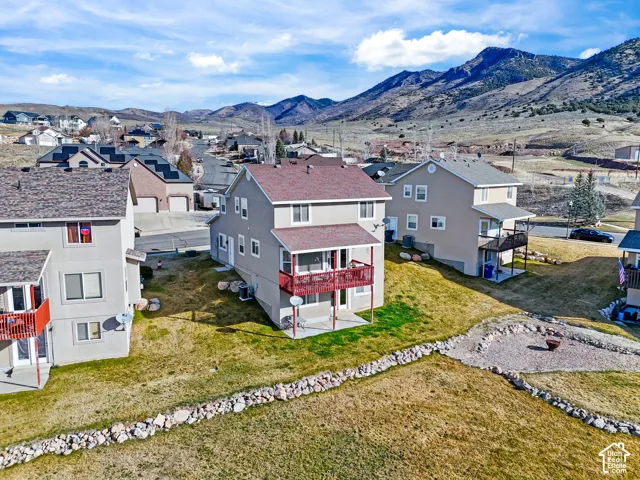 Aerial perspective of suburban area featuring mountains