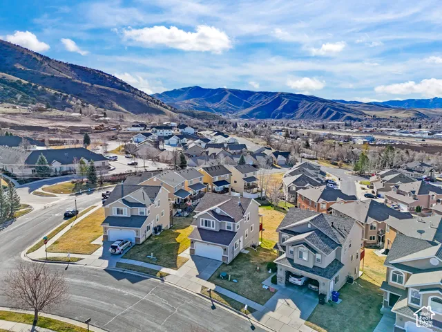 Aerial perspective of suburban area featuring mountains