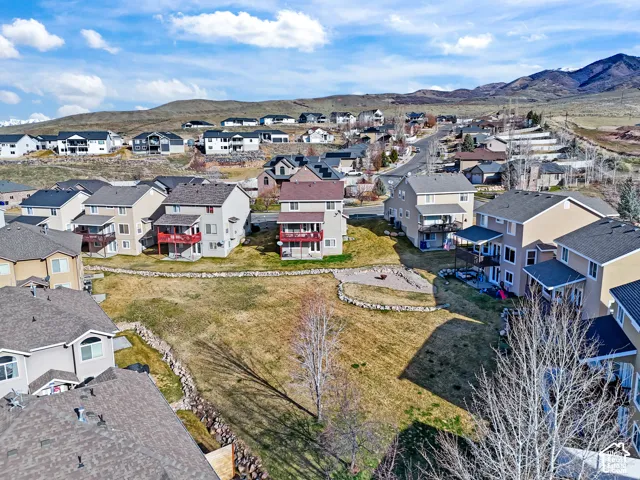 Aerial perspective of suburban area featuring mountains