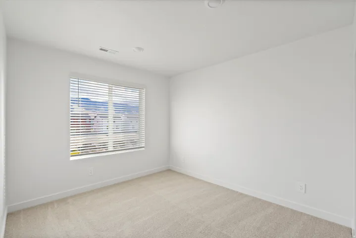 *DISCLAIMER* Interior package and colors may vary.  Unfurnished room featuring light carpet and baseboards