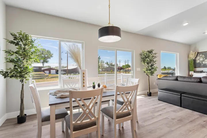 Dining room featuring light wood-style floors and recessed lighting