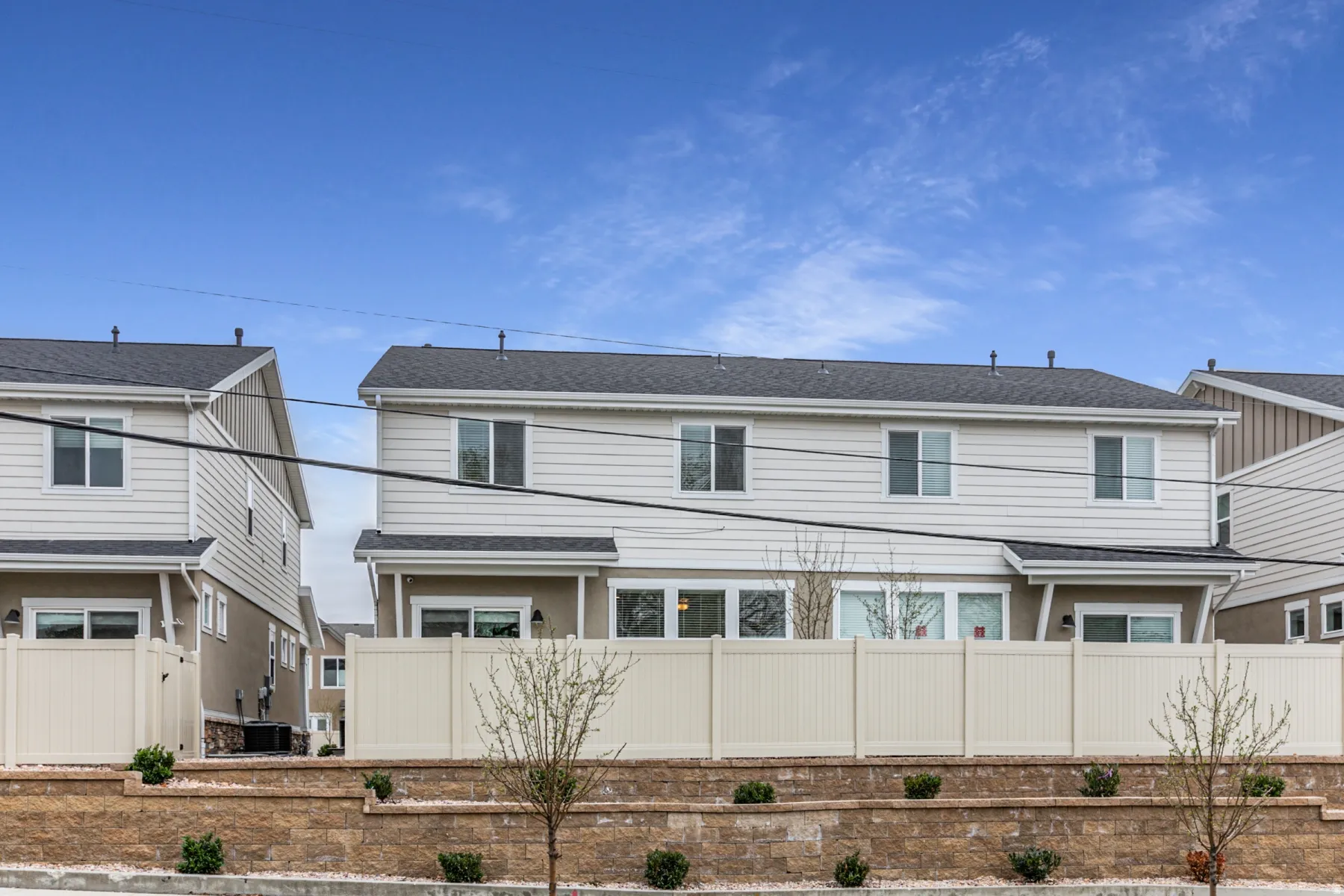 View of front of home featuring a shingled roof