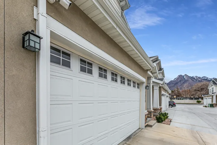 Garage with a mountain view and driveway