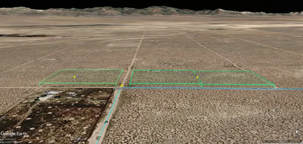 View of rural area with property parcel outlined and a mountain backdrop