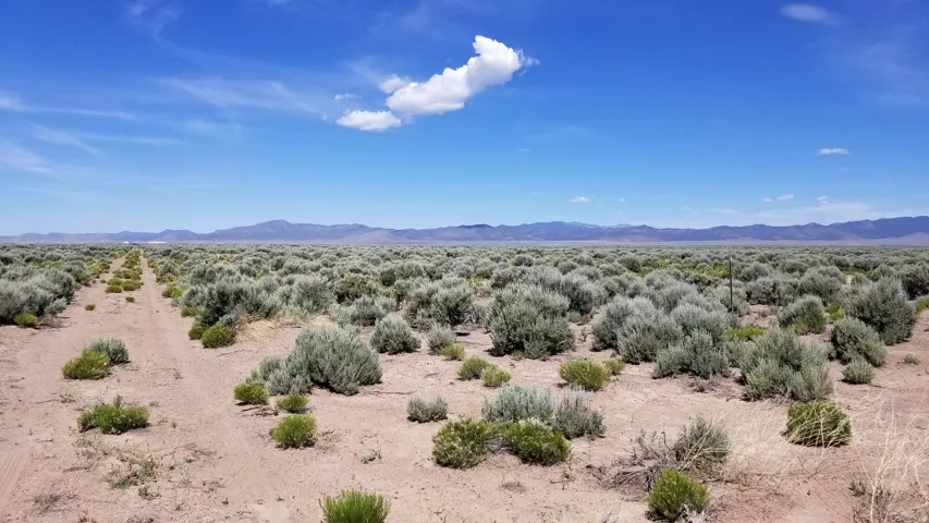 View of mountain background featuring a desert landscape and rural landscape