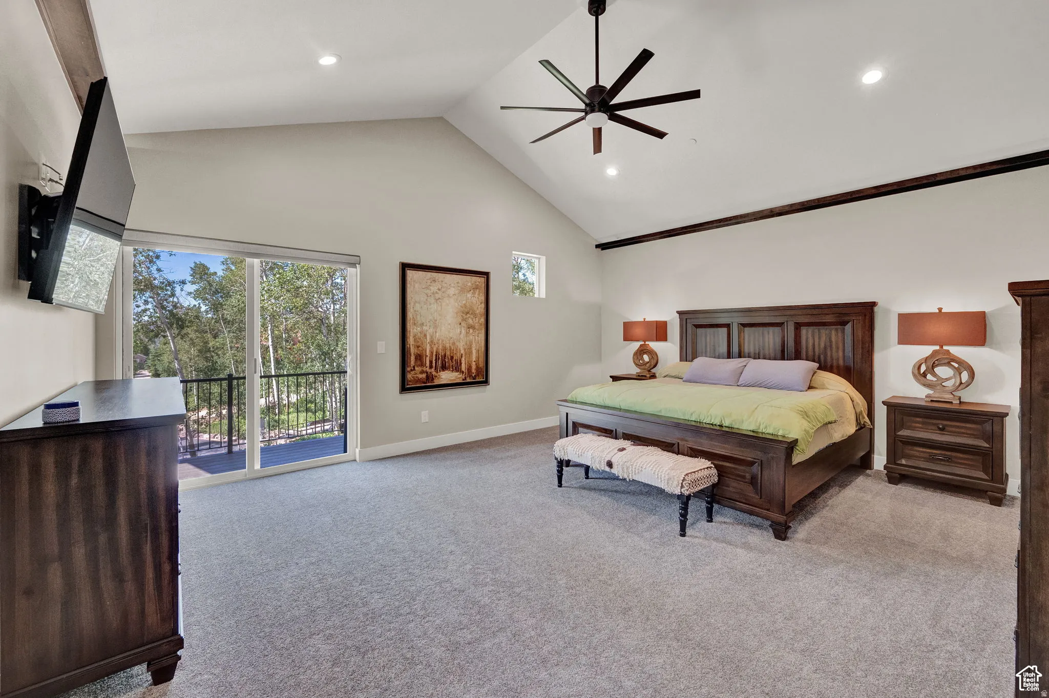 Bedroom featuring a high ceiling, access to exterior, light carpet, a ceiling fan, and recessed lighting