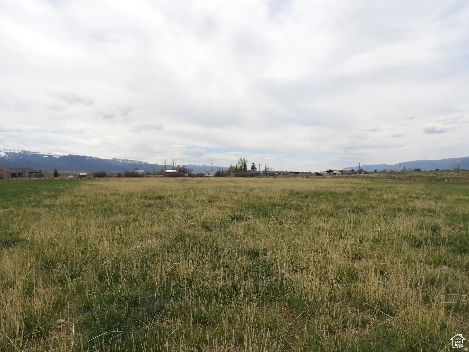 View of nature featuring a mountain backdrop and rural landscape
