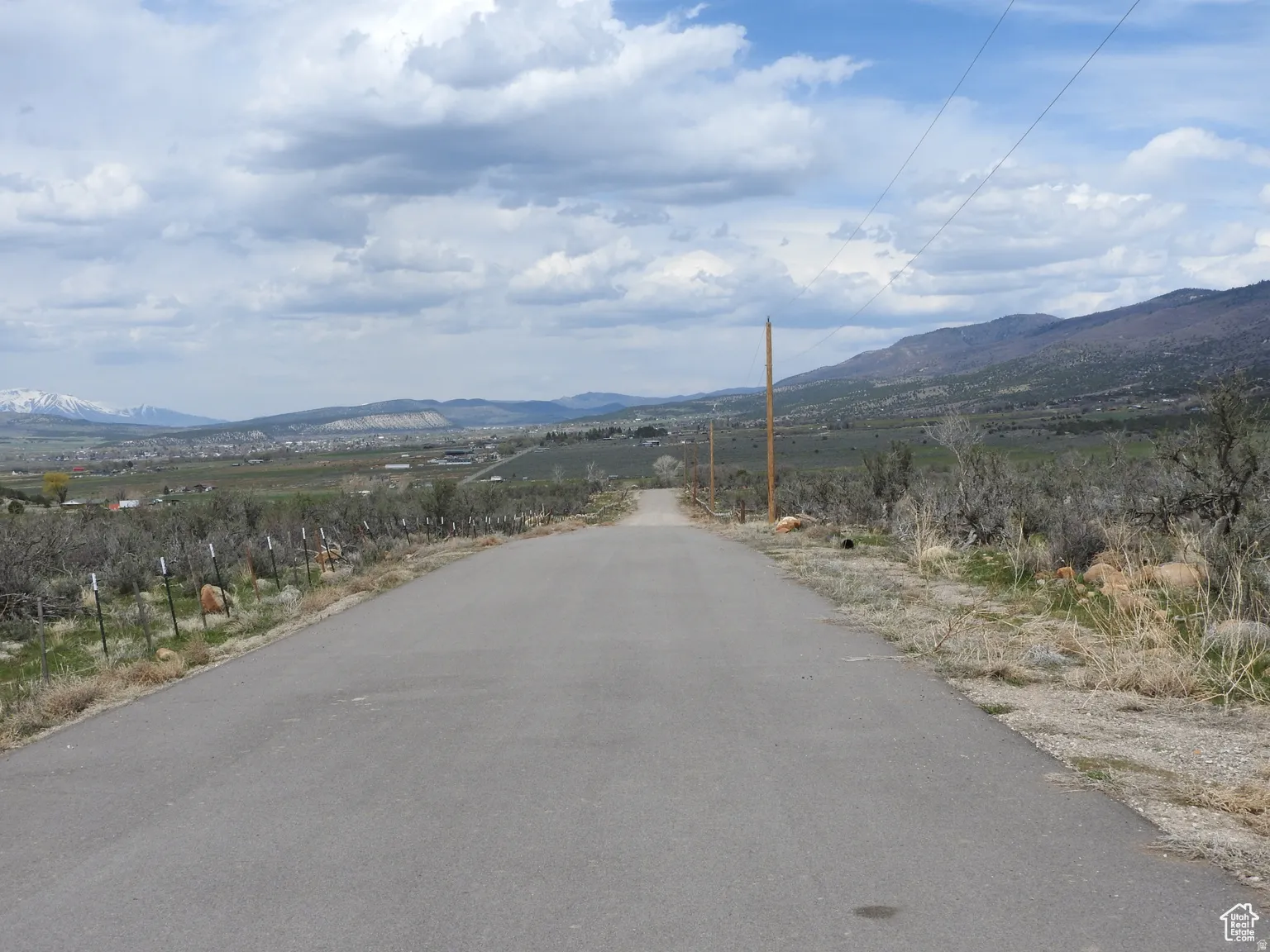 View of asphalt road with a mountain view