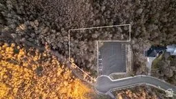 Aerial overview of property's location featuring property parcel outlined