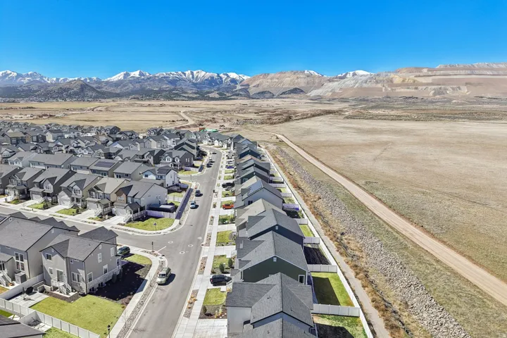 Aerial view of residential area with mountains