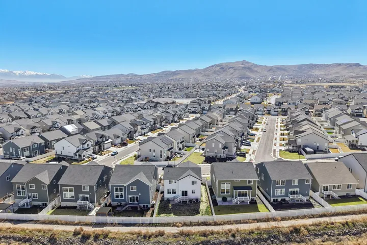 Aerial perspective of suburban area with mountains