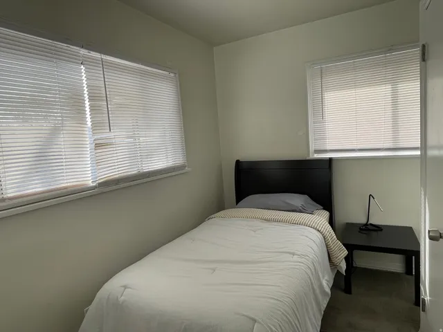 Bedroom featuring carpet flooring