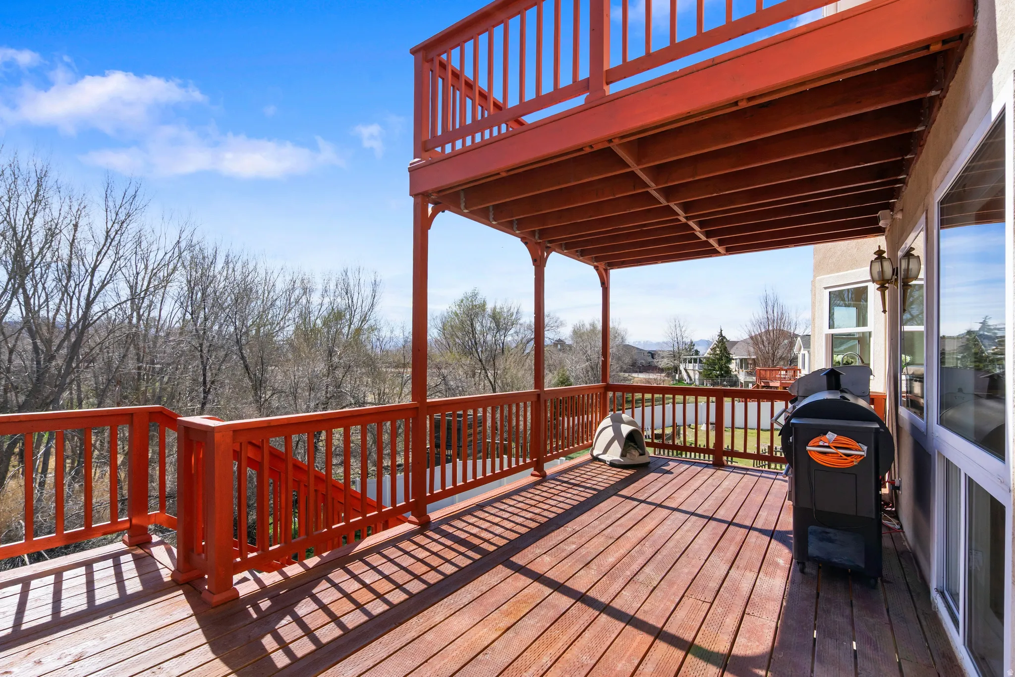 Deck featuring a grill