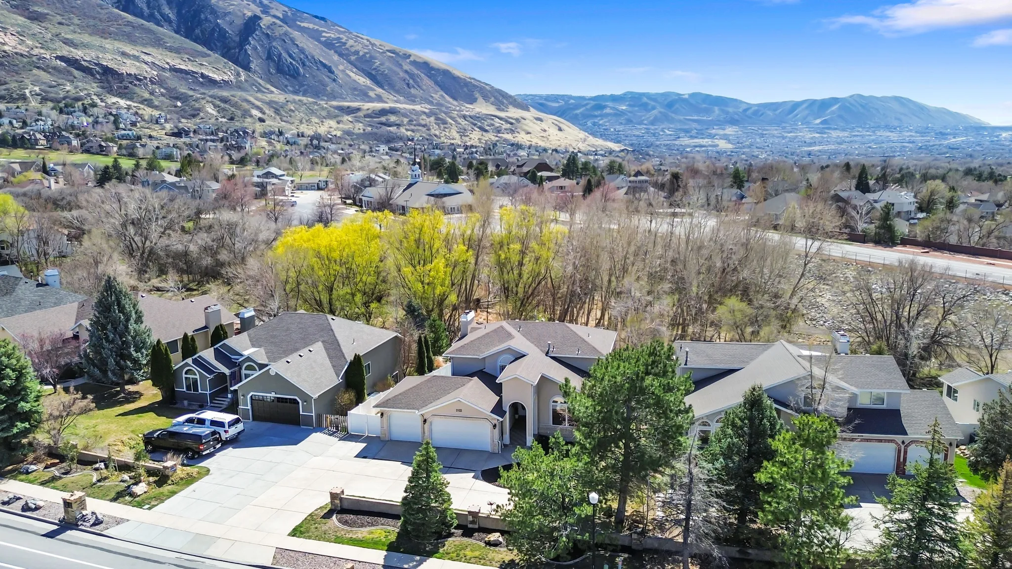 Aerial view of residential area featuring mountains