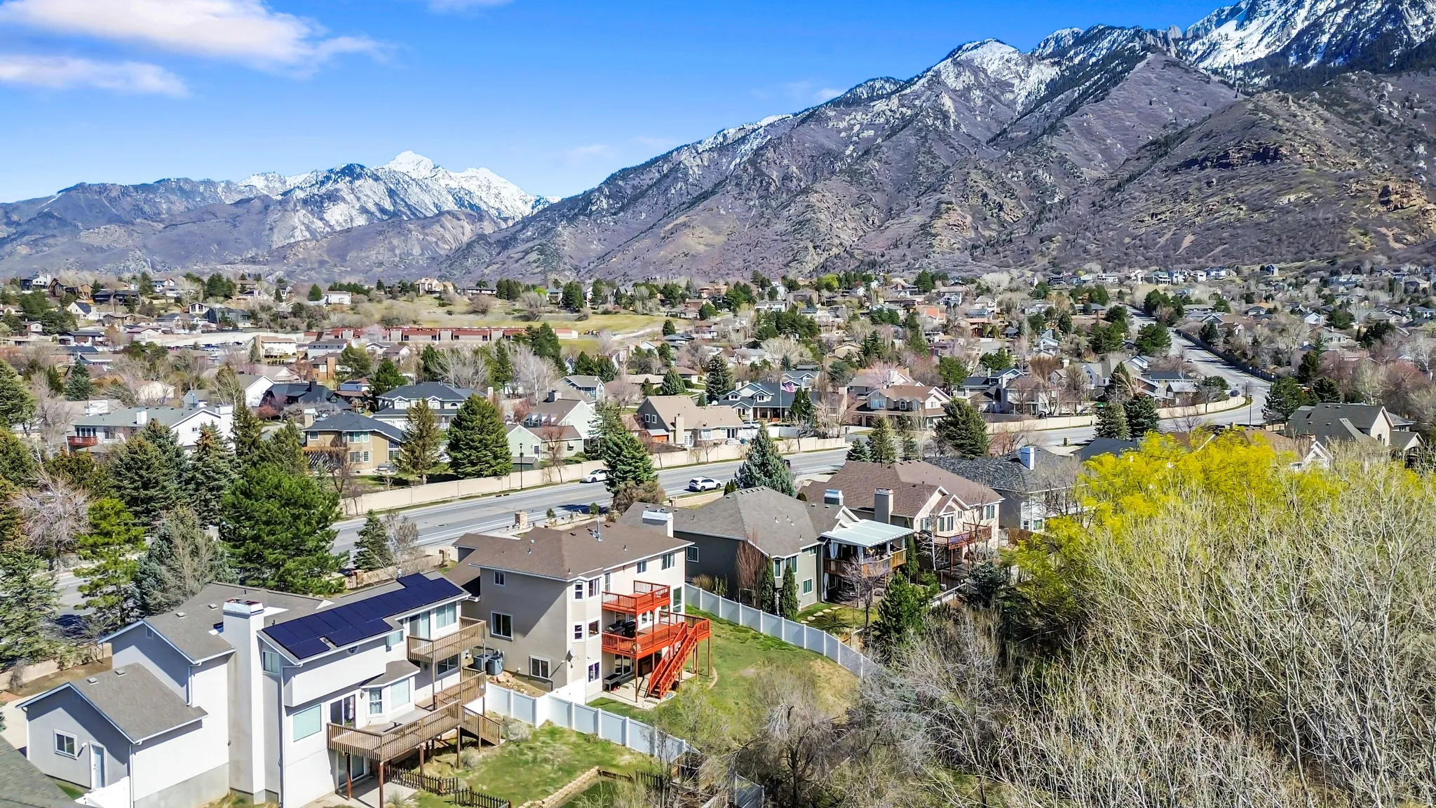Aerial view of residential area with mountains