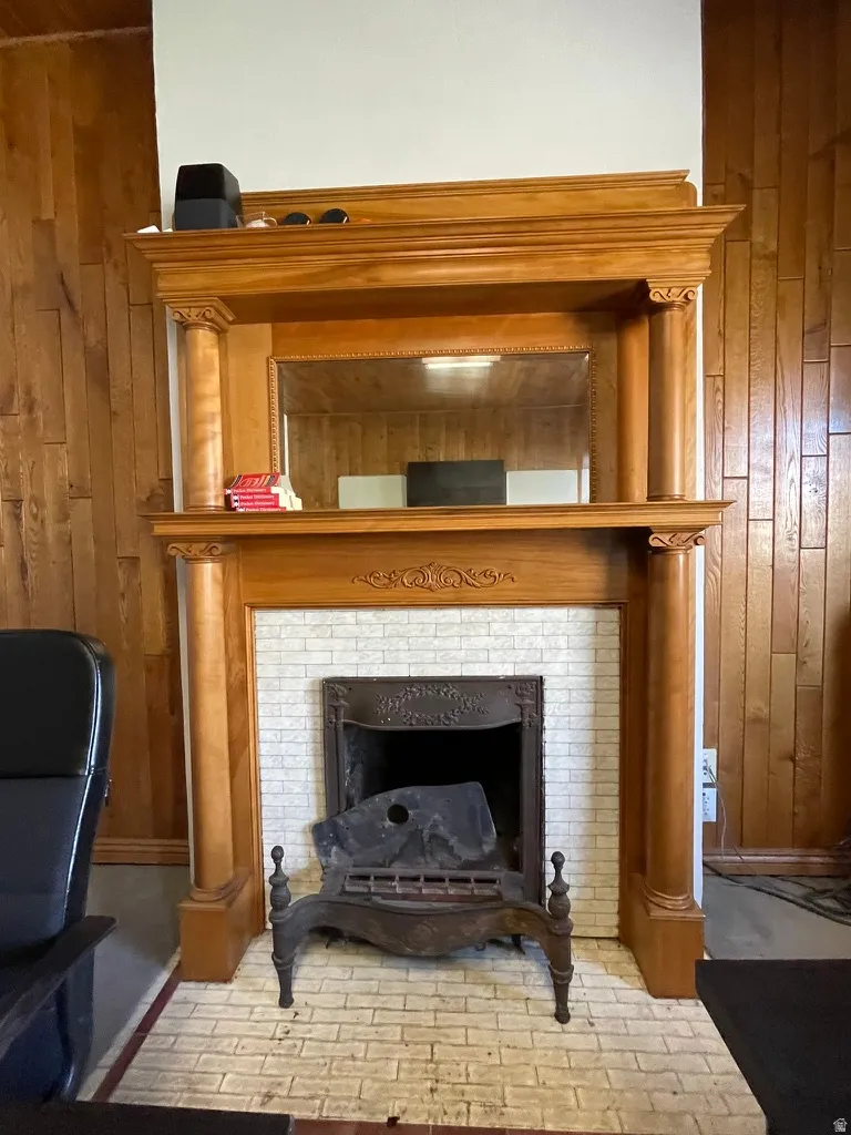 Detailed view of wood walls and a fireplace