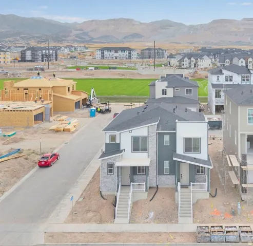 Aerial view of residential area with a mountain backdrop