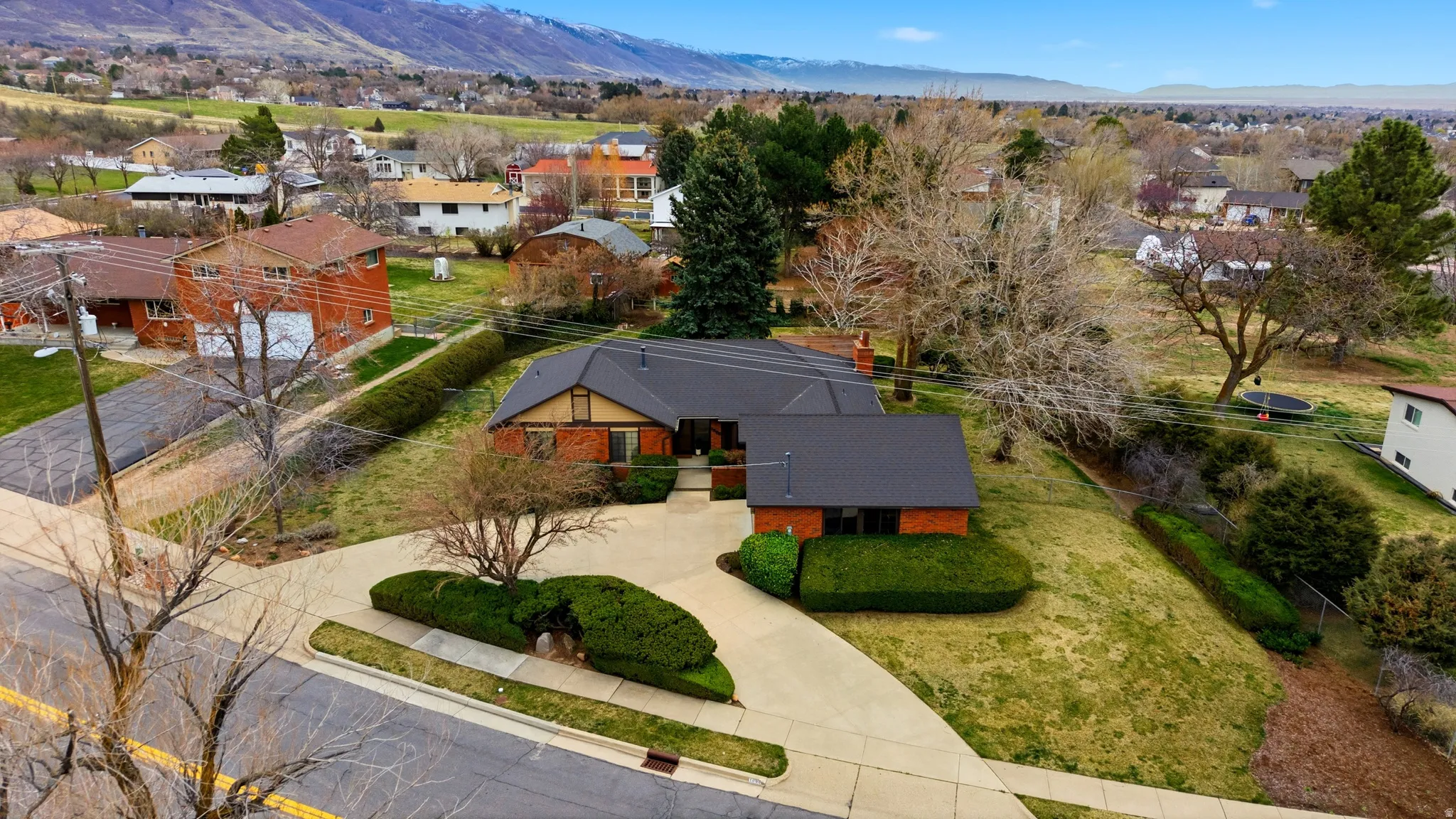 Aerial perspective of suburban area featuring mountains