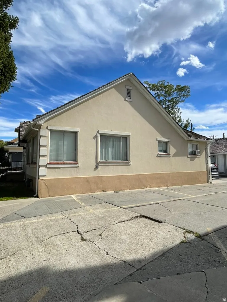 View of side of property with stucco siding