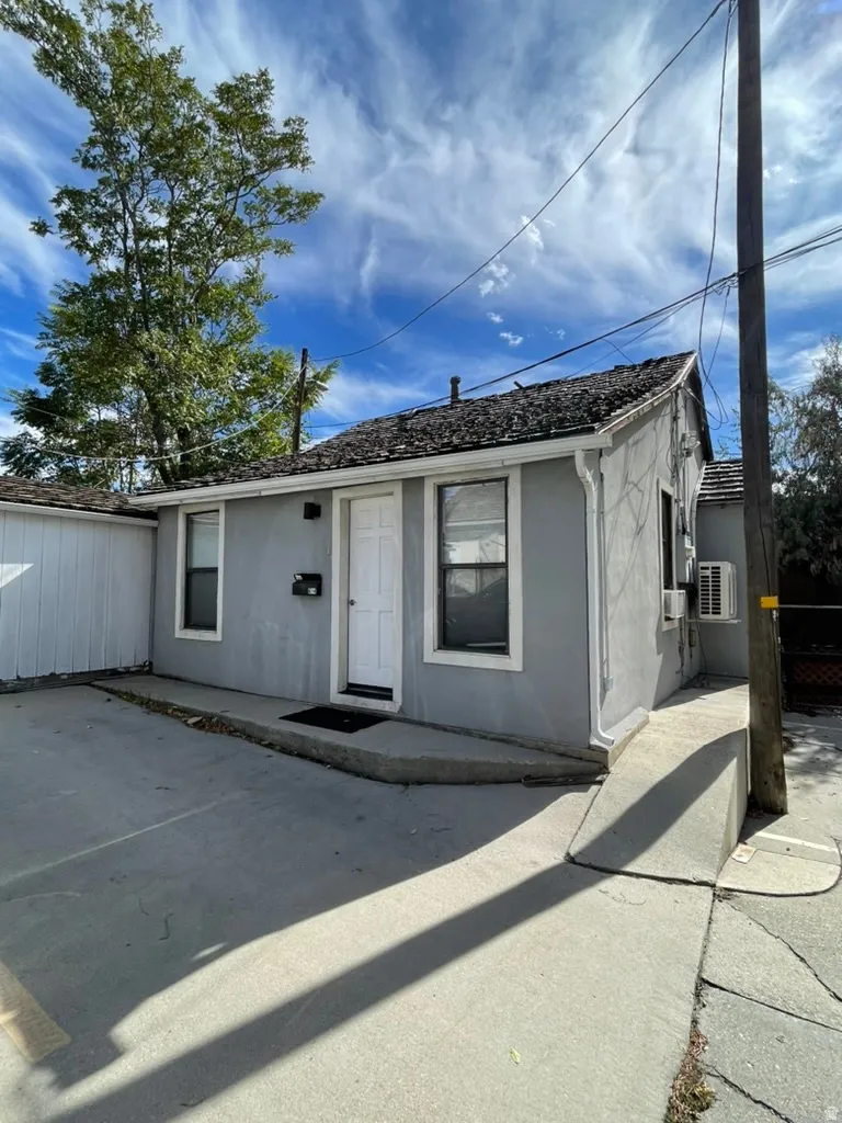 View of front of house with stucco siding