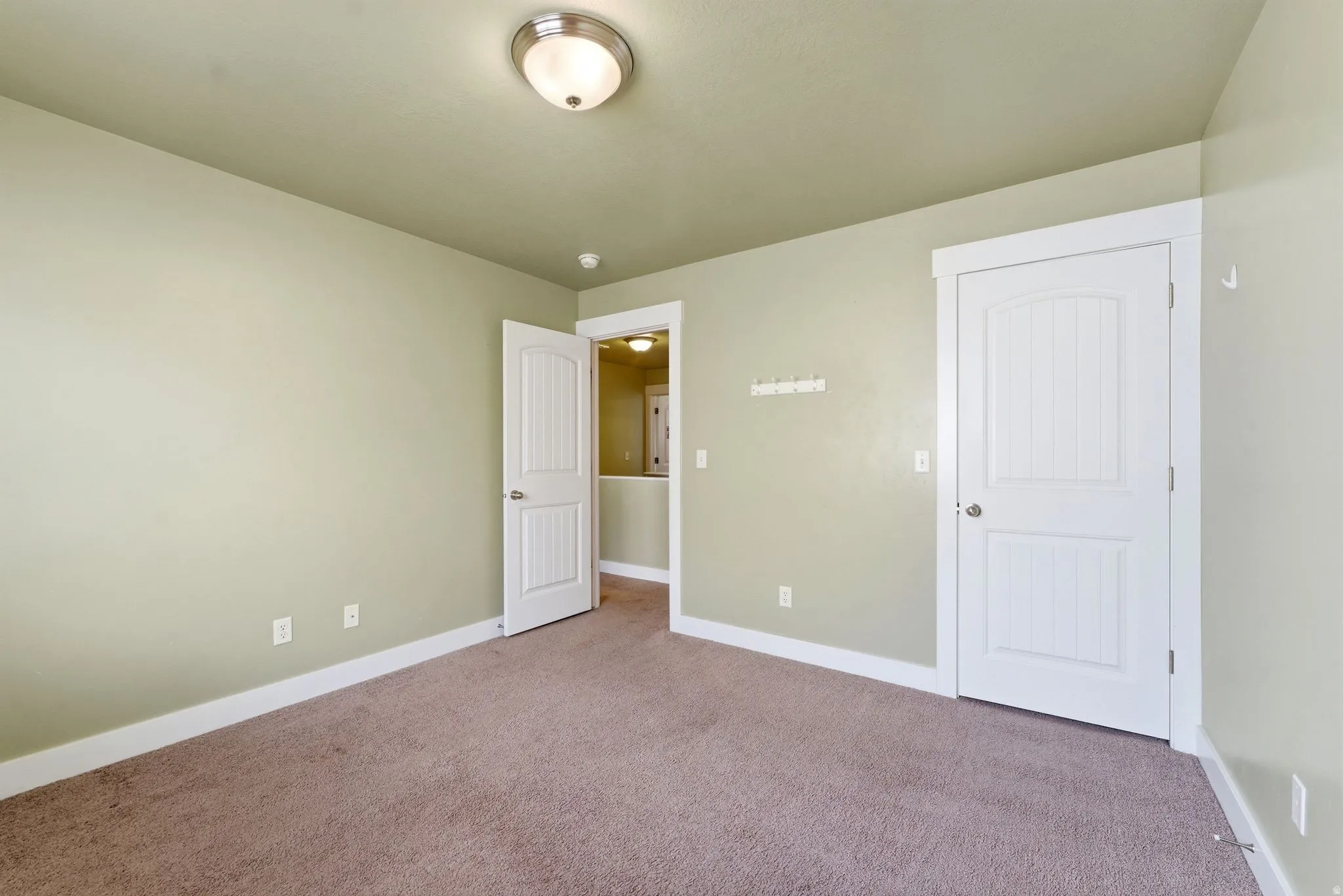 Bedroom #1 facing closet and entry