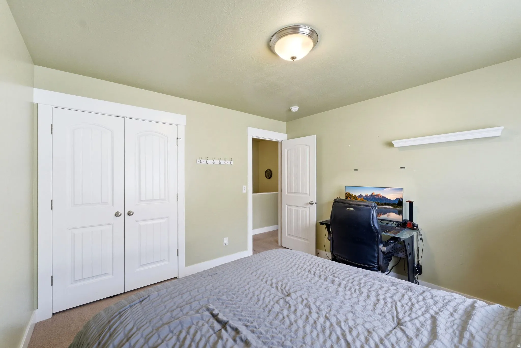 Bedroom #2 facing closet and entry