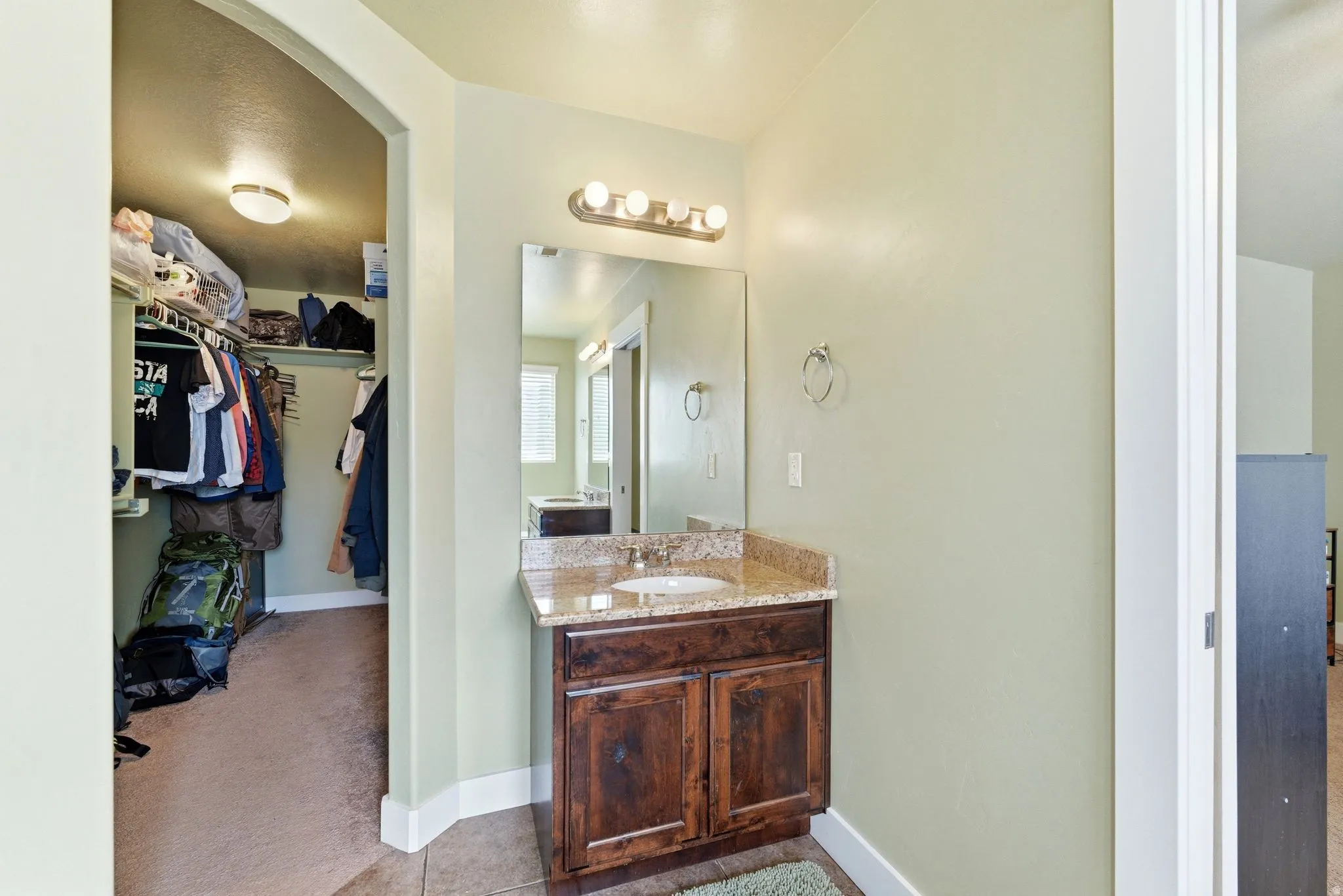 En suite bathroom with second vanity