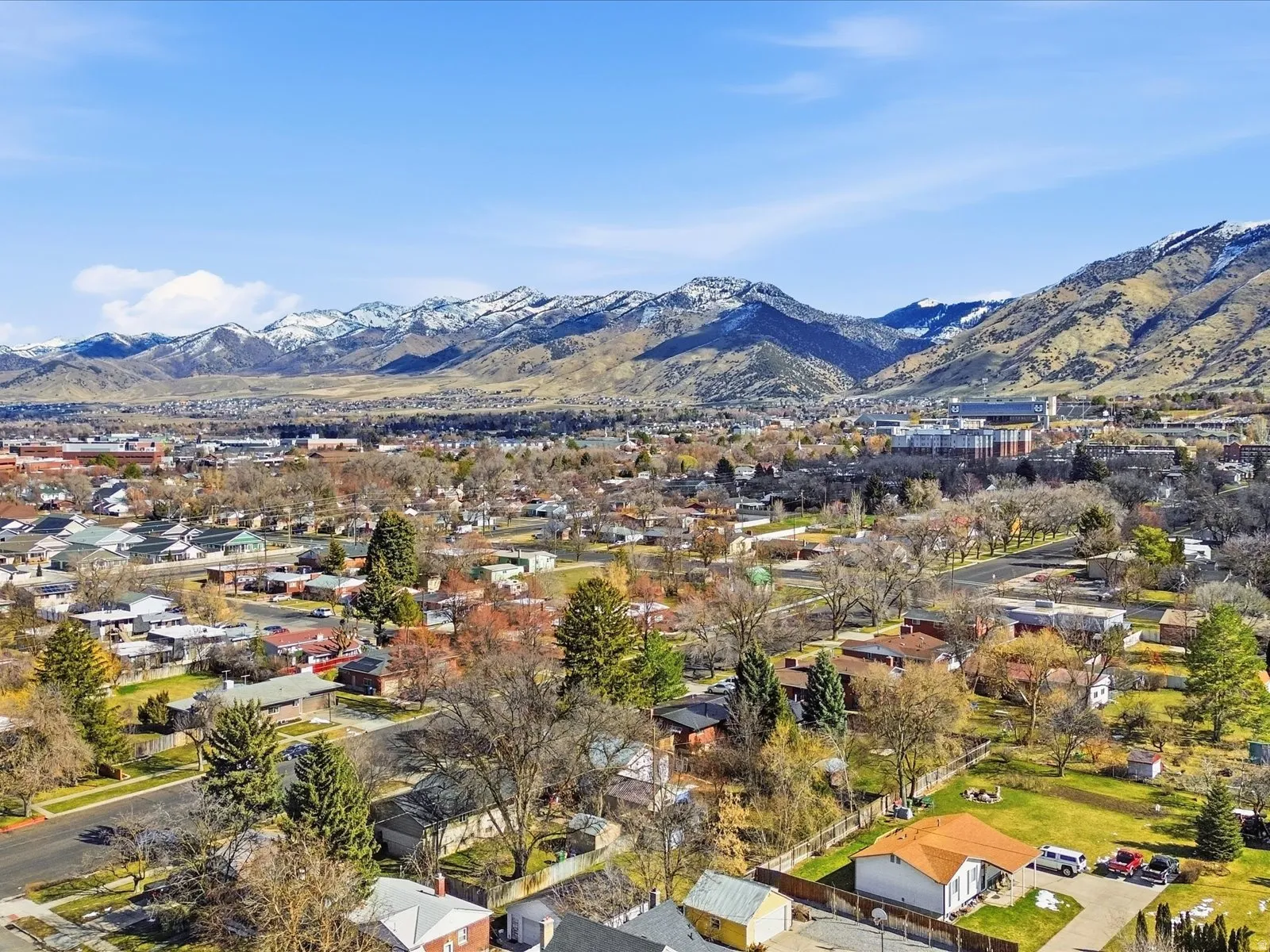 Aerial perspective of suburban area with mountains