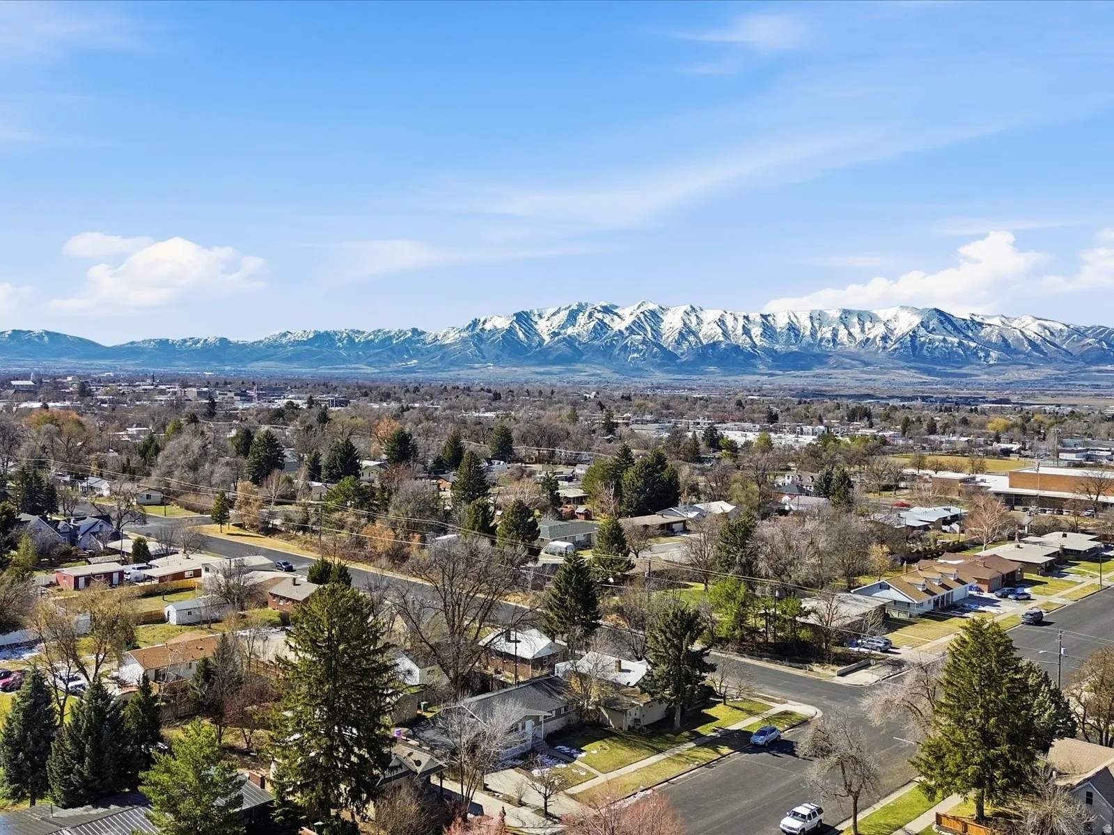 Aerial perspective of suburban area featuring mountains