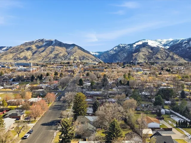 View of mountain background featuring nearby suburban area