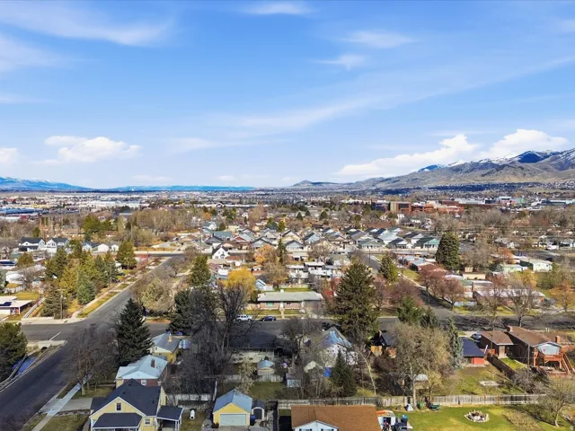 Aerial view of residential area with a mountain backdrop