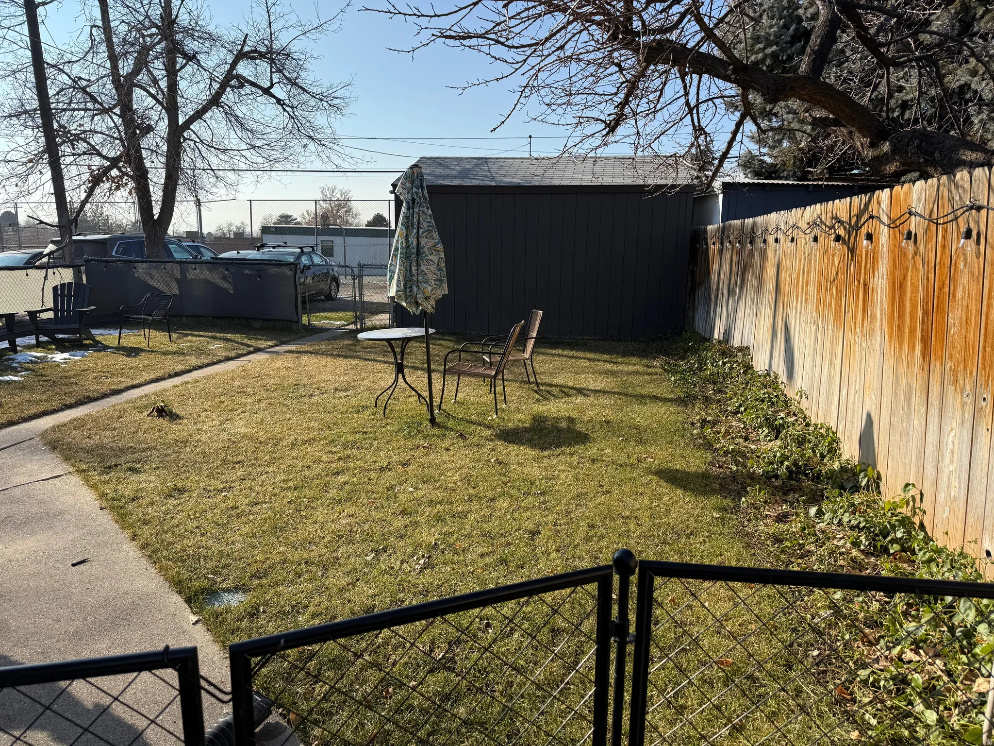 View of fenced backyard