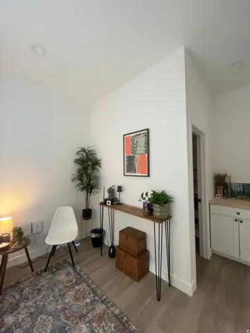 Living area with wood finished floors