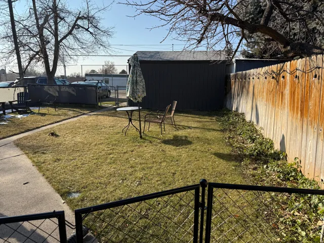 View of fenced backyard