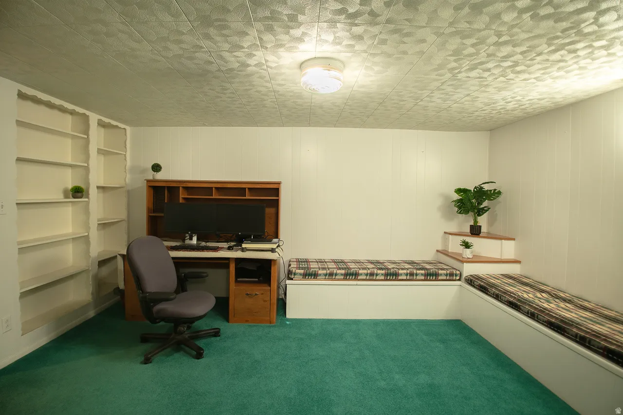 Half of the basement family room--being used as an office space