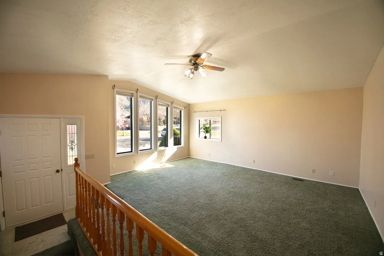Main floor family room with vaulted ceilings
