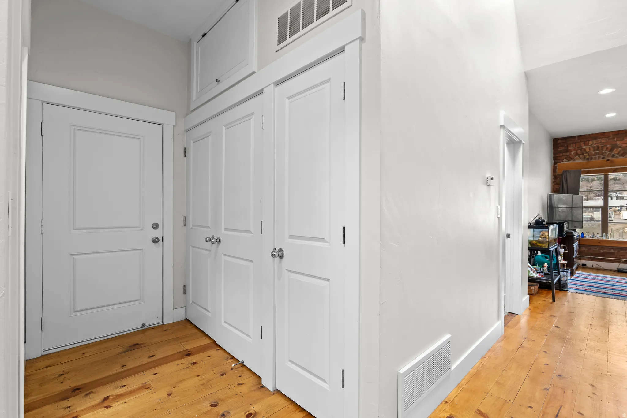 Second level apartment - laundry closet and staircase entry