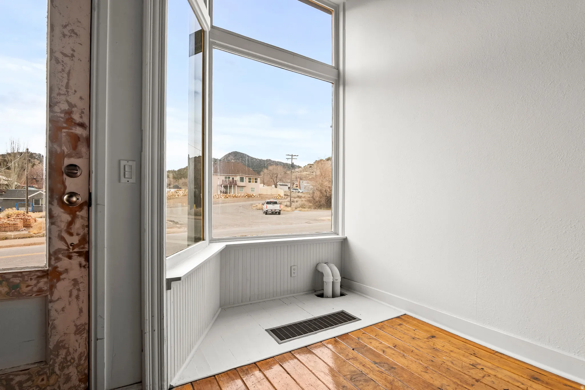 AI rendering - if all items removed from the room. Retail / office space - main floor.