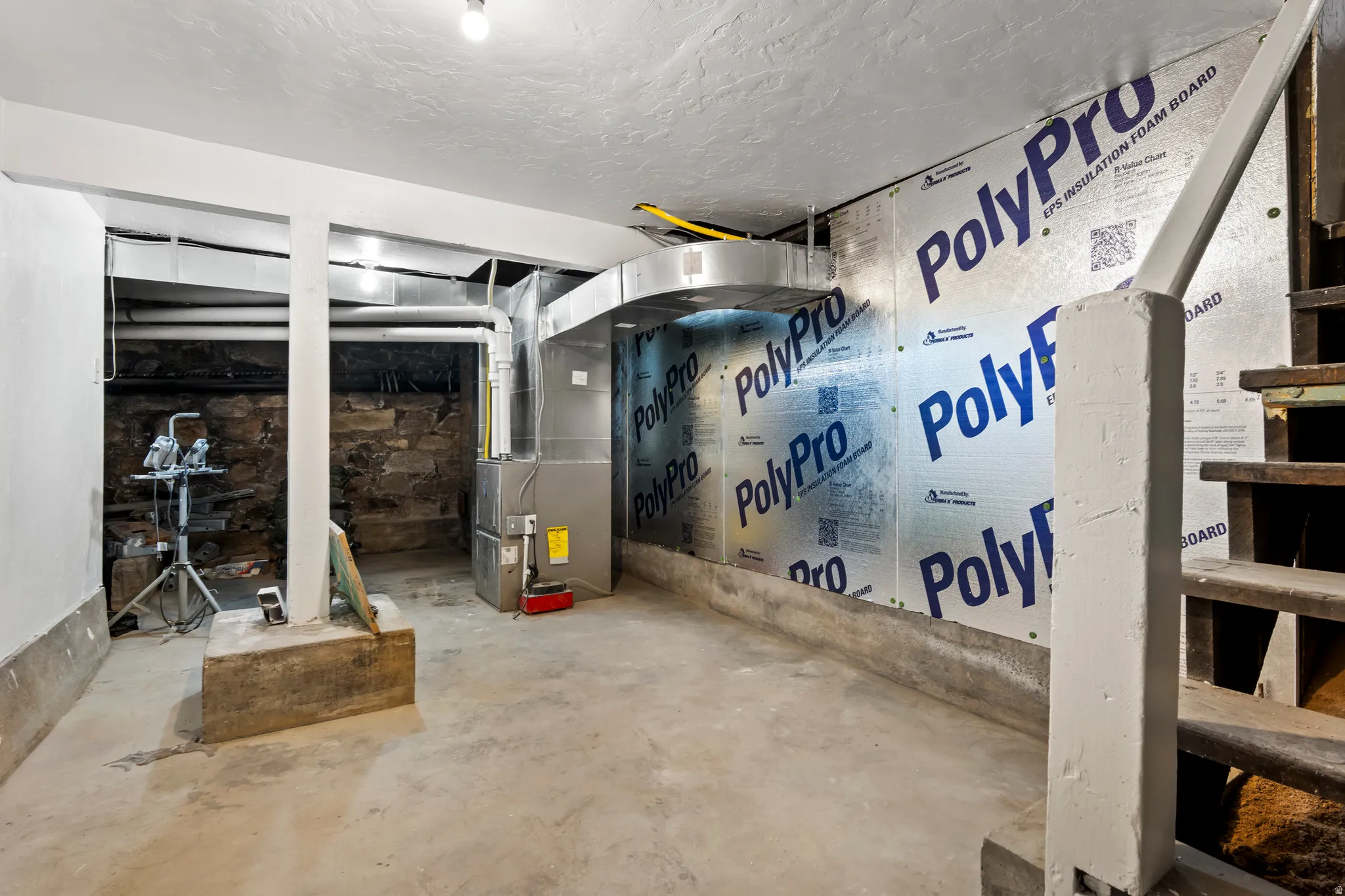 Unfinished basement with furnace