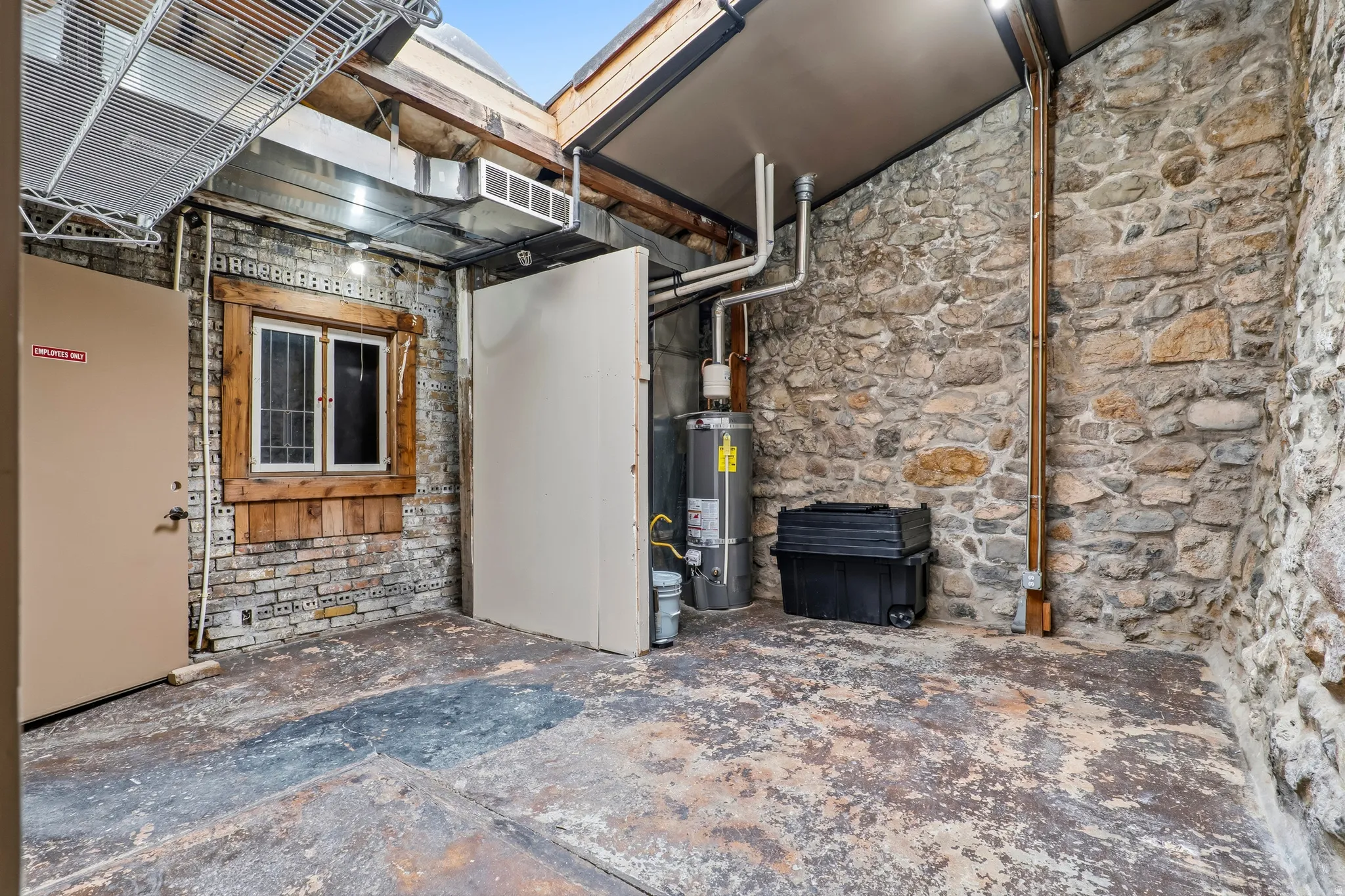 Below grade area with water heater