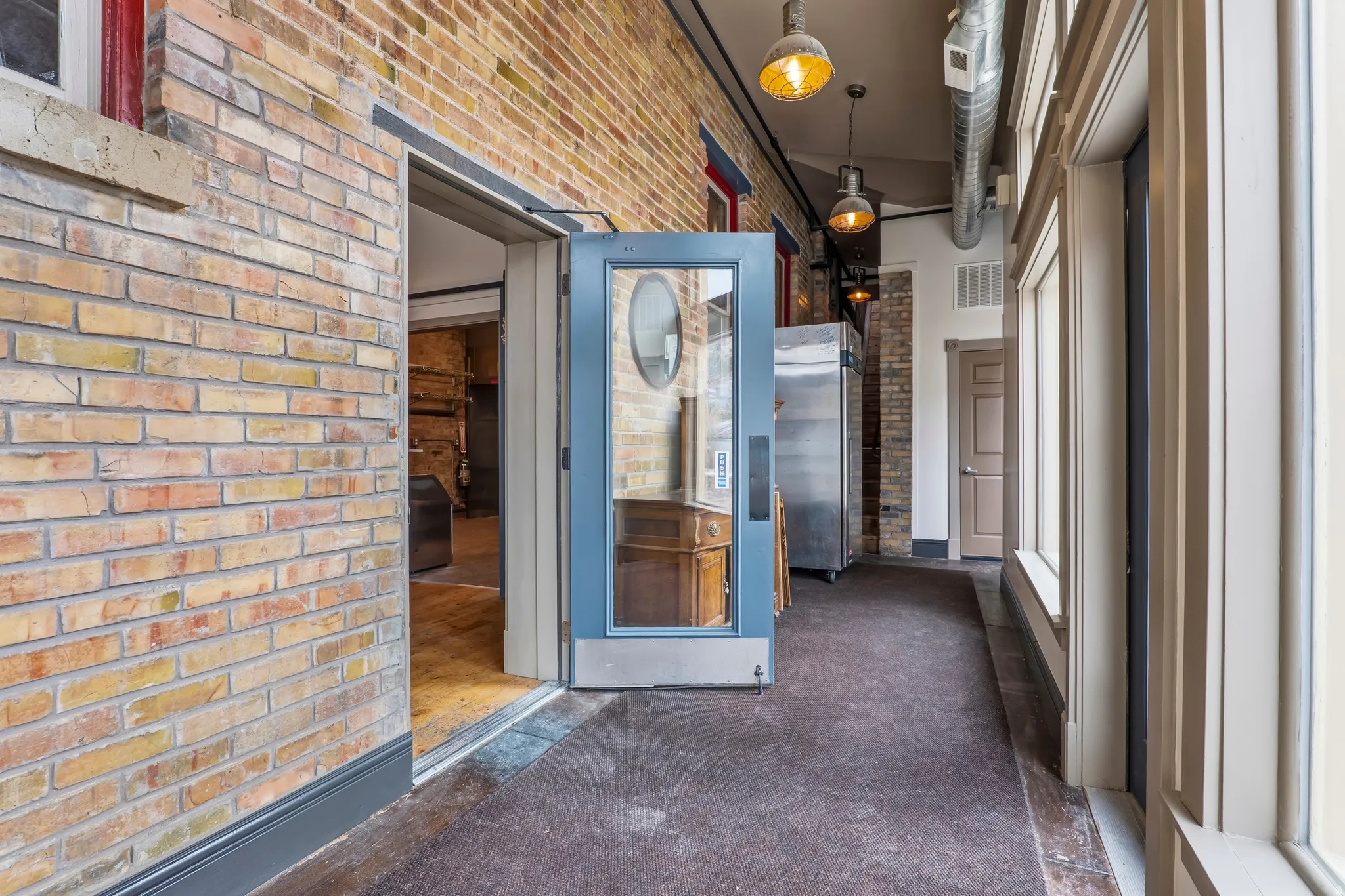 Hallway with brick wall