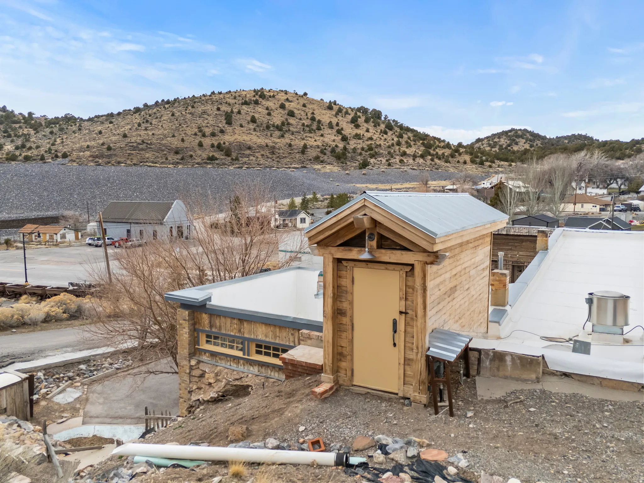 View of outbuilding with a mountain view and a residential view
