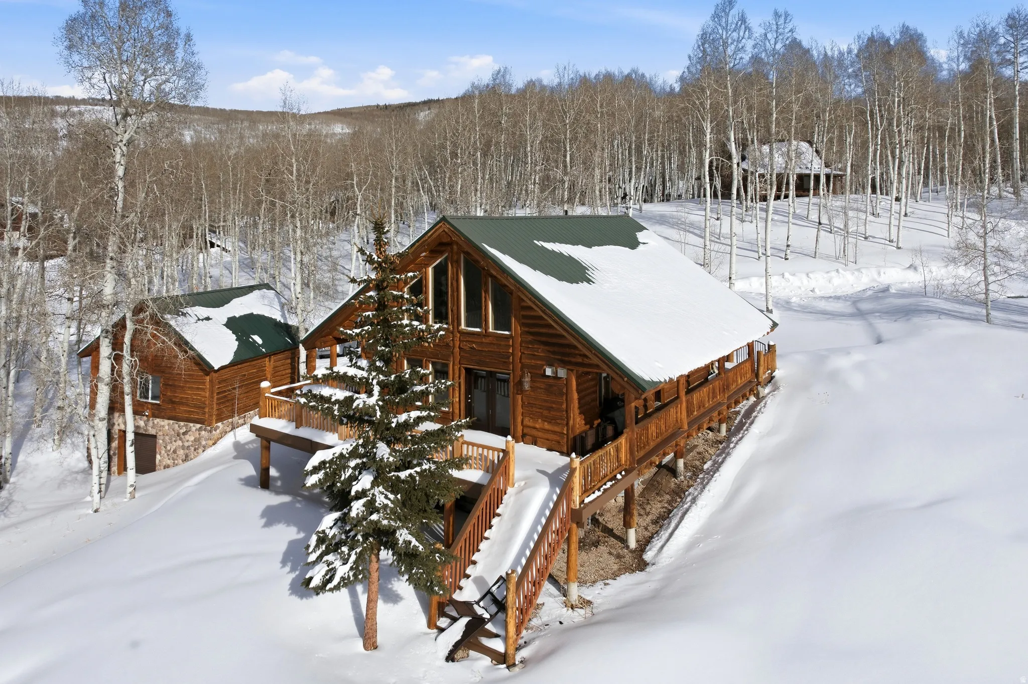 View of property exterior featuring a porch