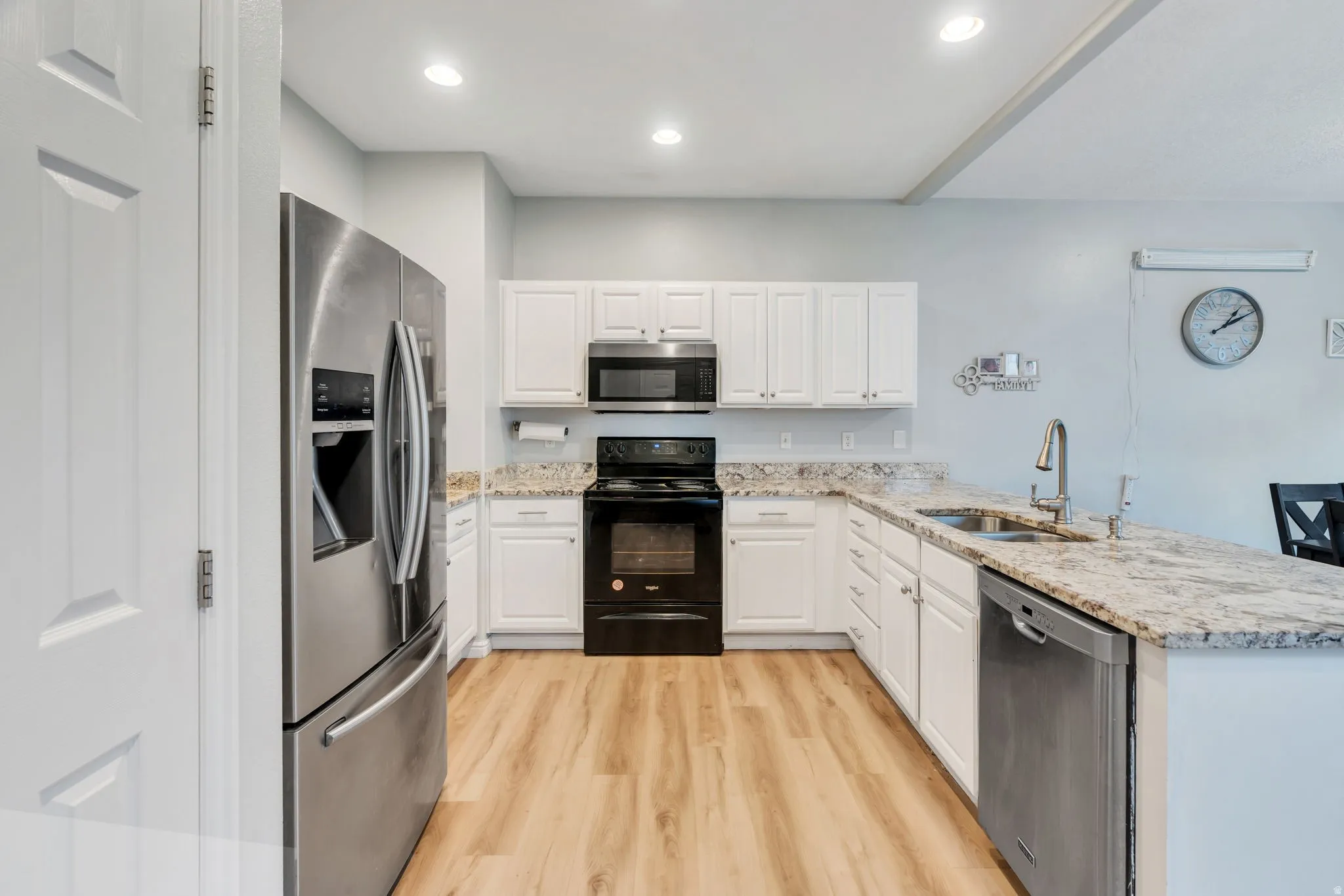 Stainless steel appliances, including a French door refrigerator, built in microwave & dishwasher