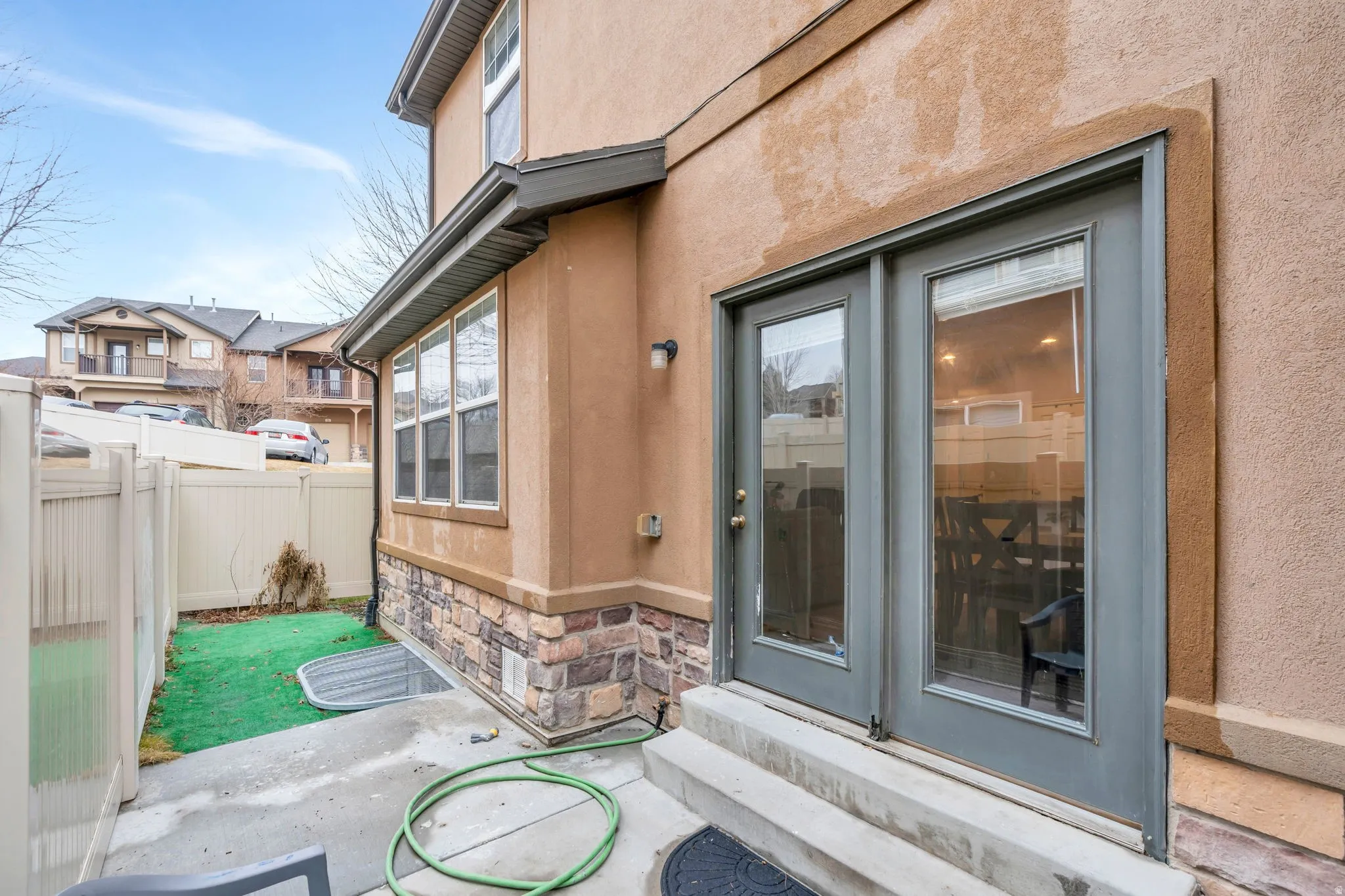 French Doors open up from the dining room to this lovely patio