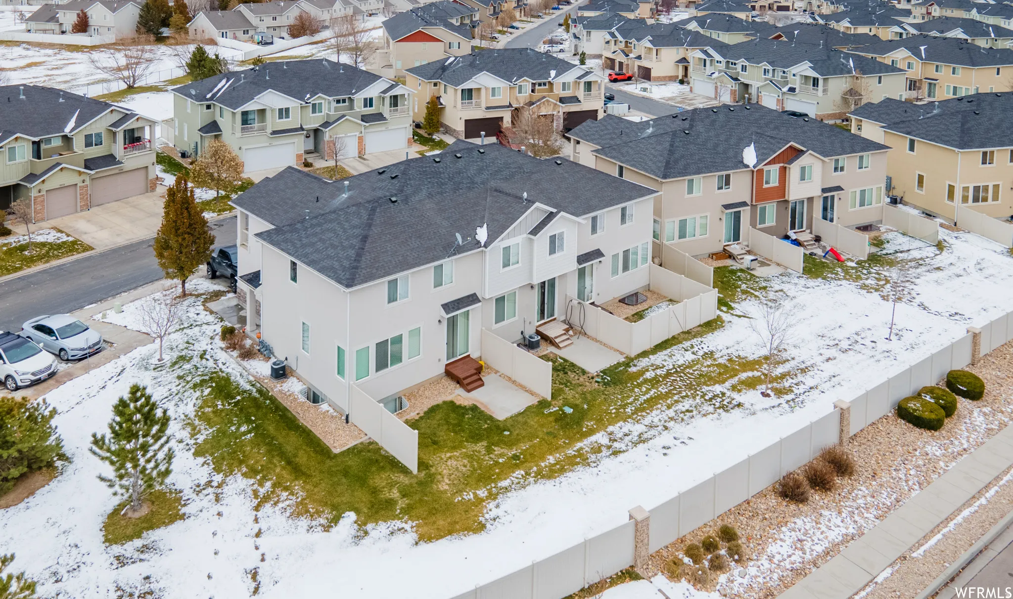 Snowy aerial view with a residential view