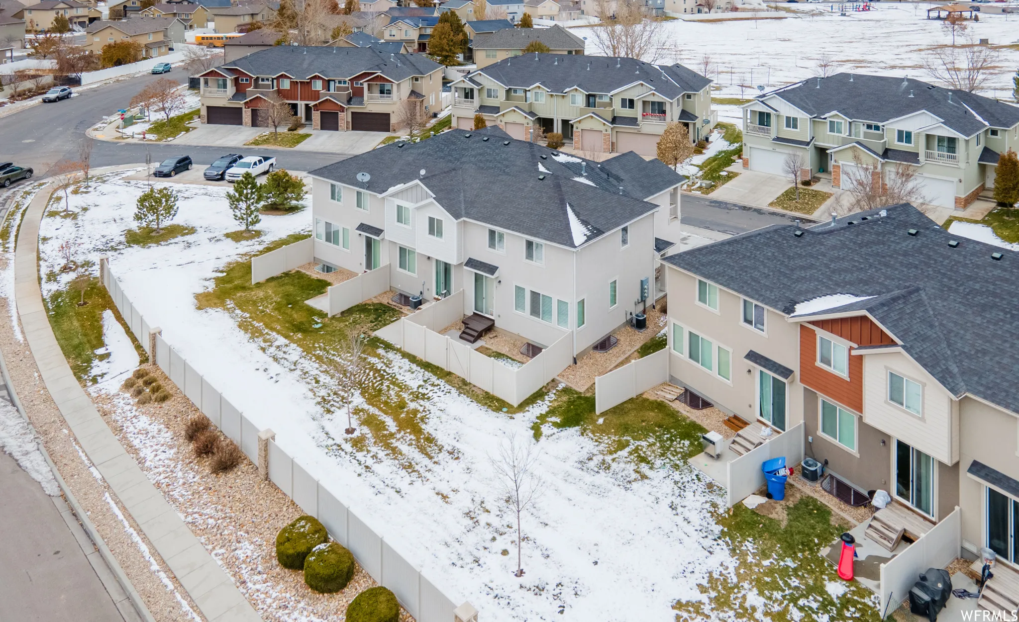 Snowy aerial view with a residential view
