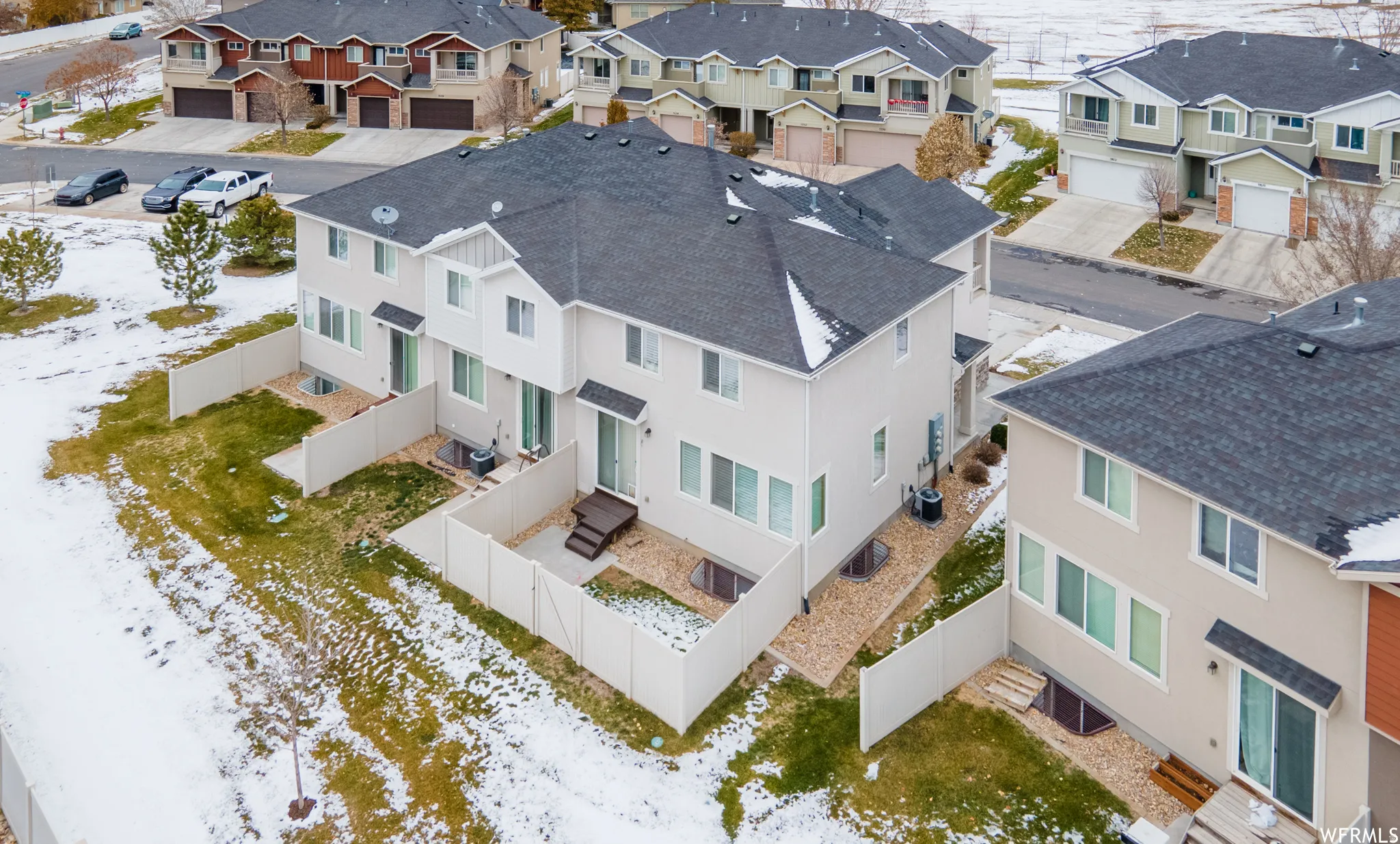 Snowy aerial view with a residential view