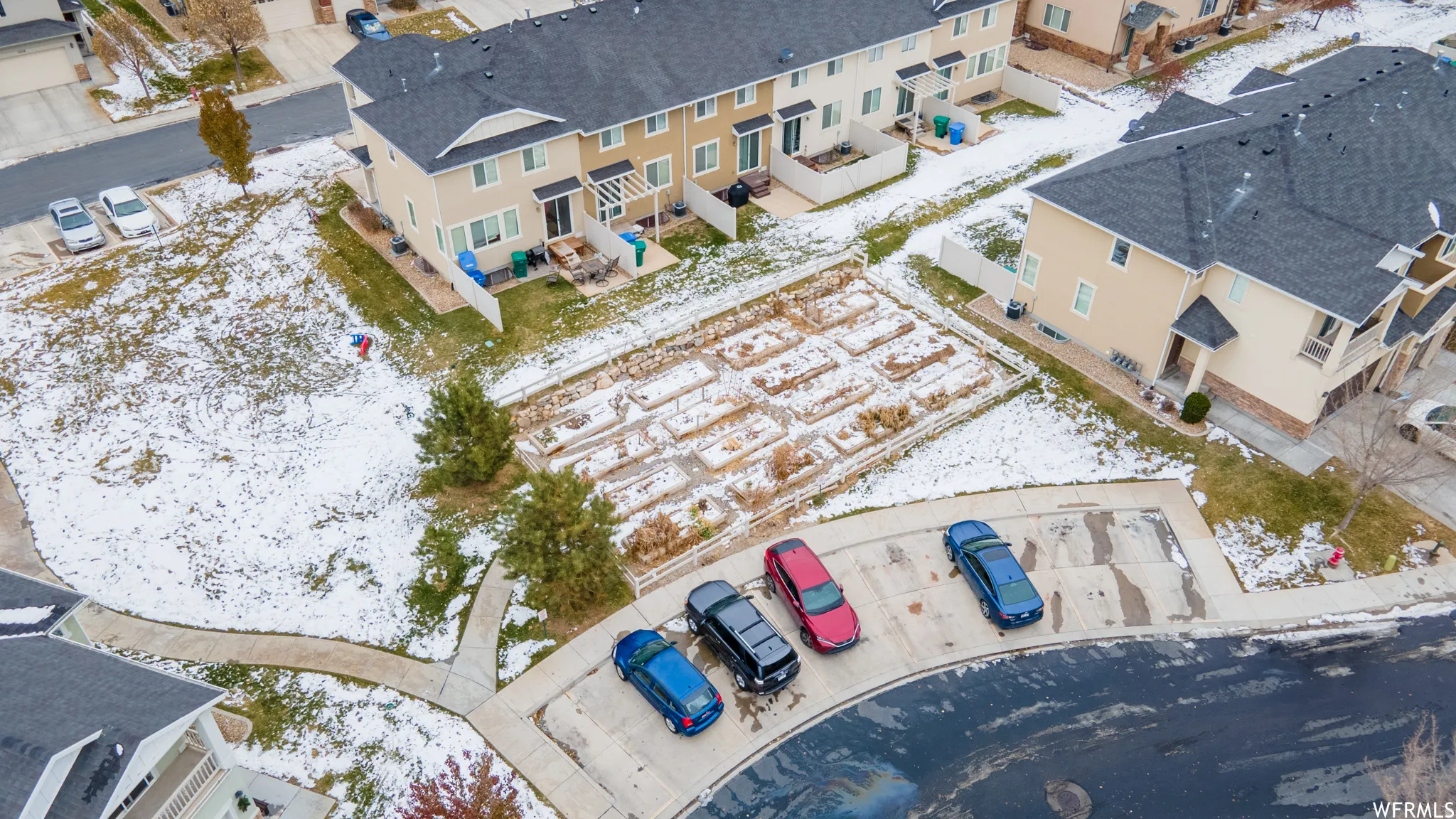 Snowy aerial view with a residential view